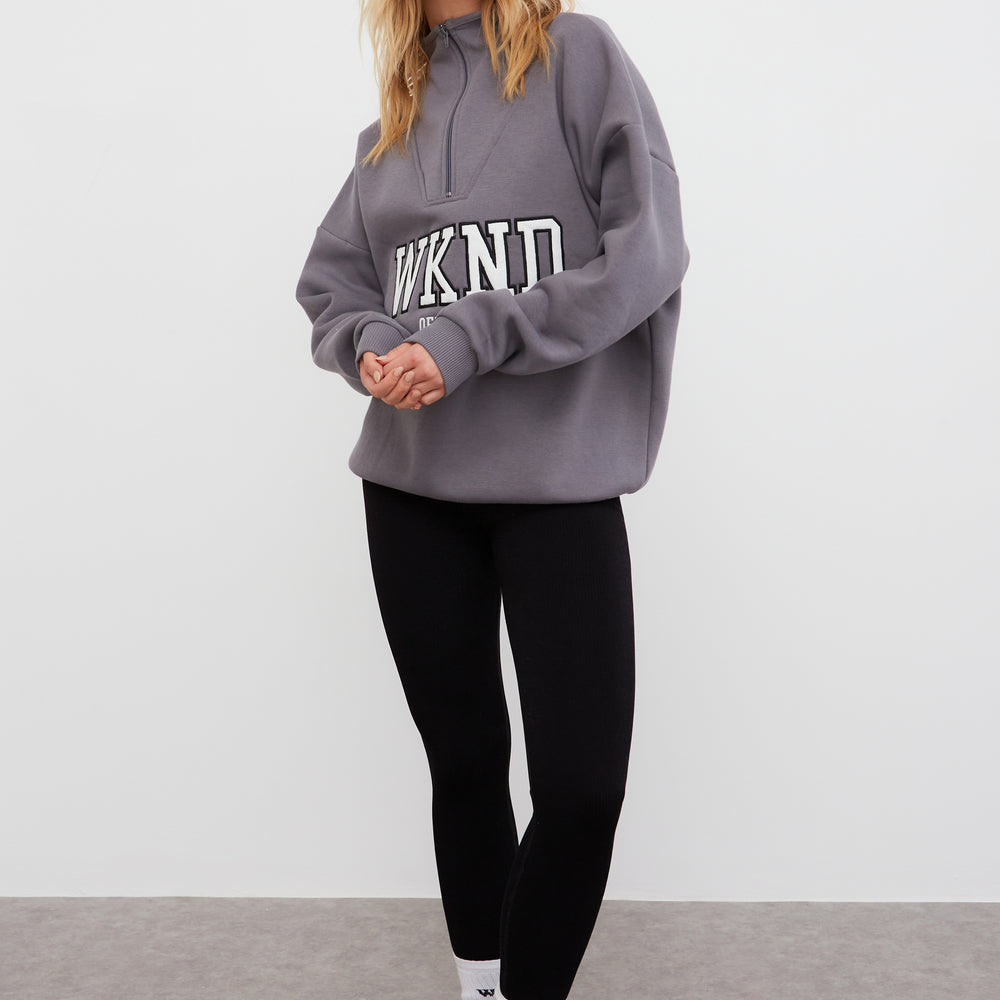 
                      
                        WKND HALF ZIP SWEAT
                      
                    