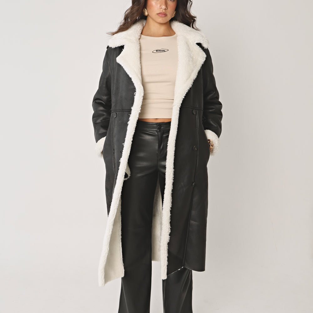 BLACK AND CREAM LONGLINE SHEARLING COAT