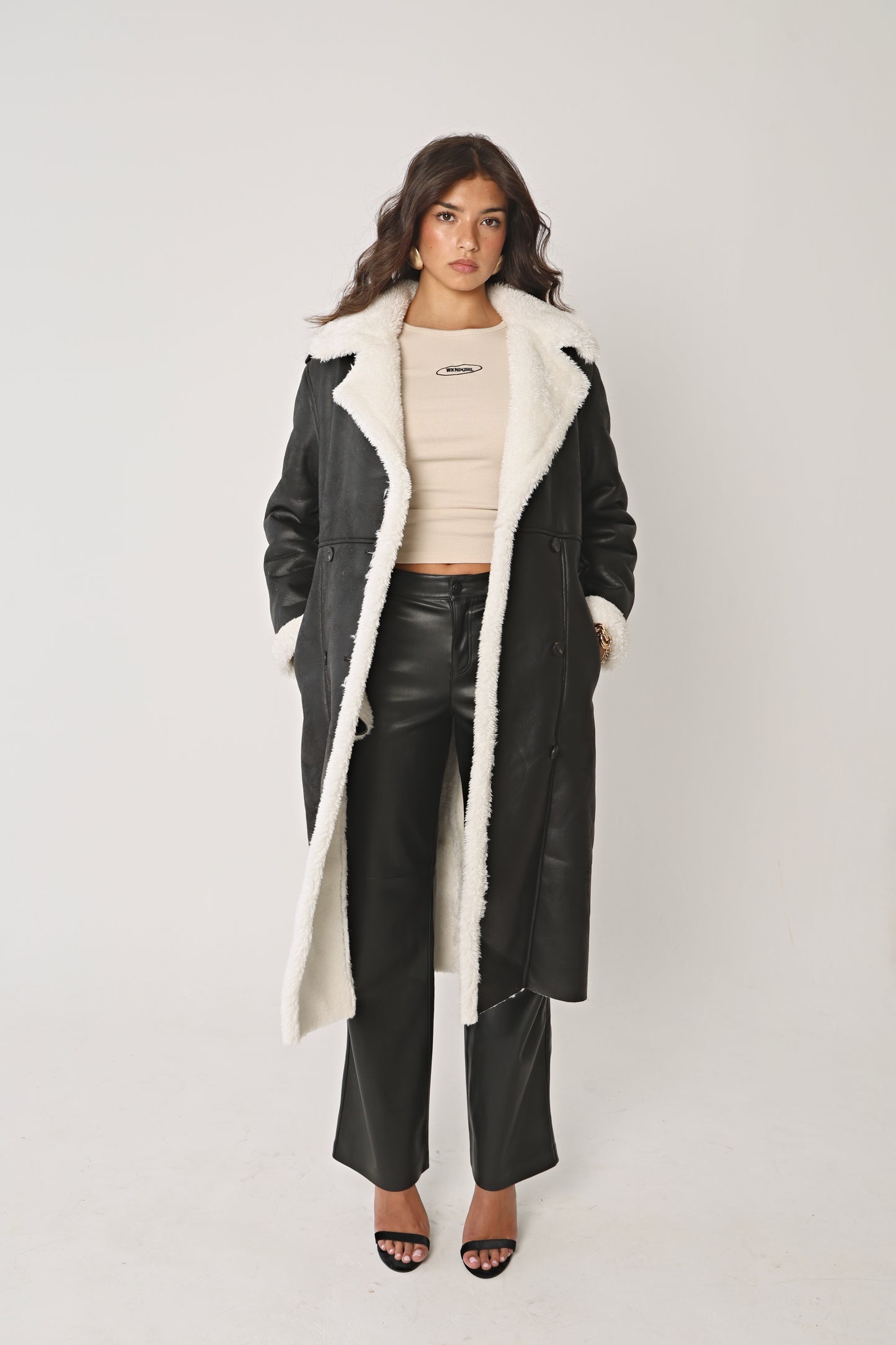 BLACK AND CREAM LONGLINE SHEARLING COAT