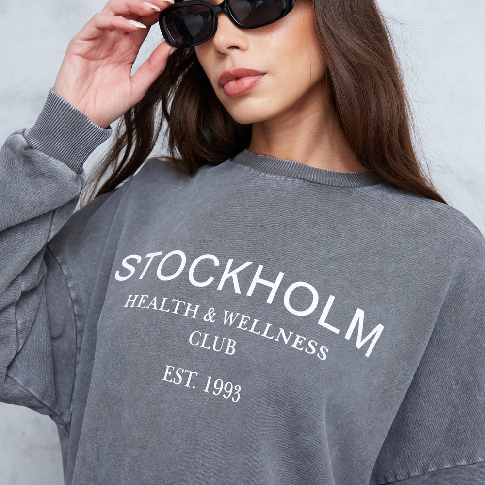 
                      
                        Acid Wash Stockholm Sweat Top - WKND Girl
                      
                    