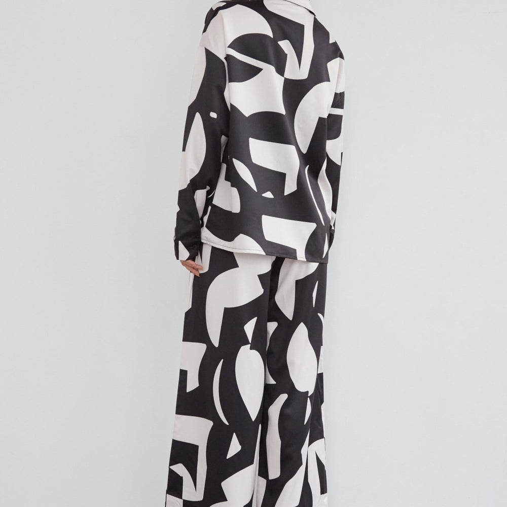 
                      
                        Abstract Printed Satin Wide Leg Trousers
                      
                    