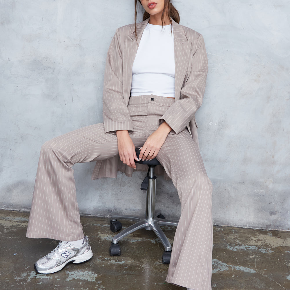 
                      
                        TAILORED PINSTRIPE FLARE TROUSERS
                      
                    