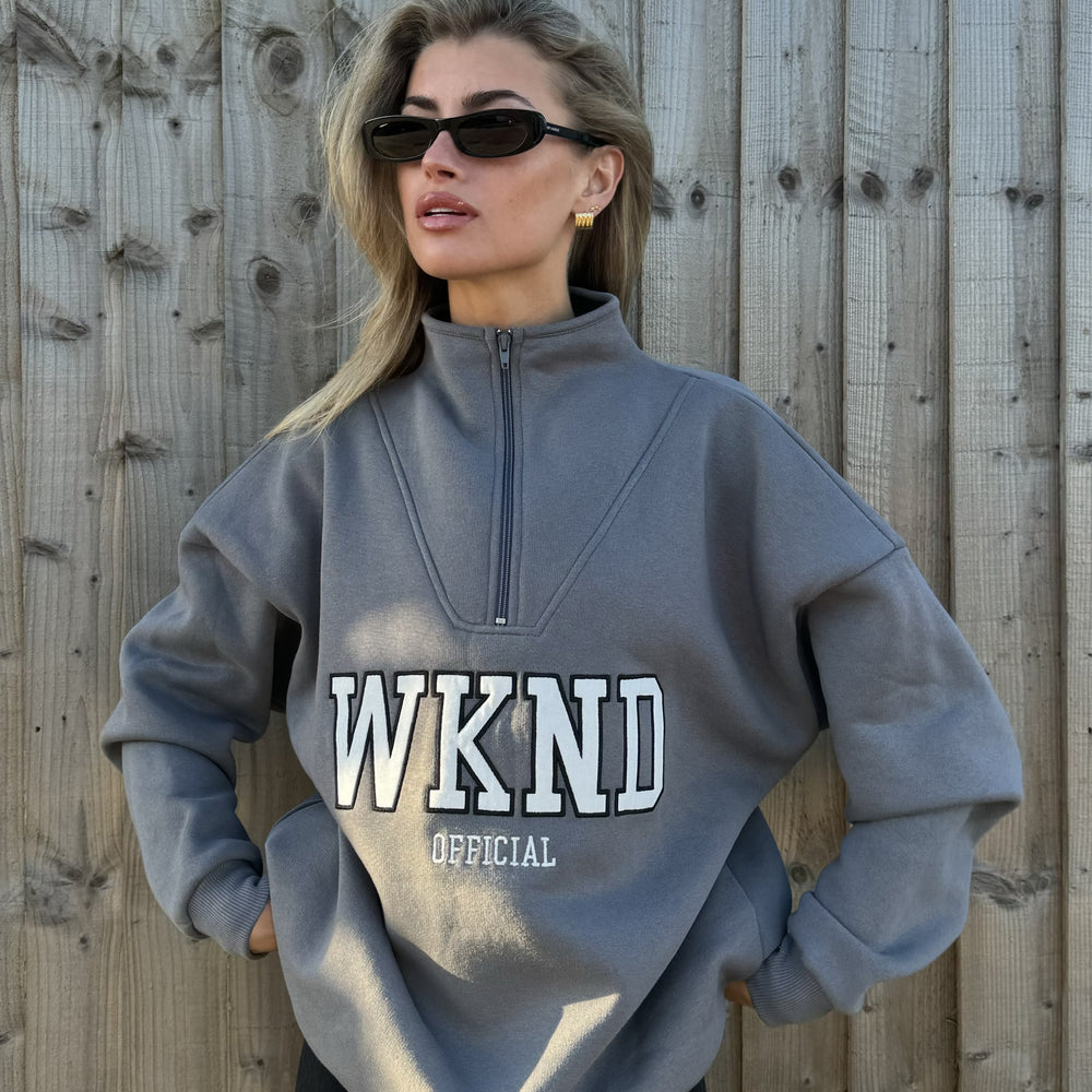 
                      
                        WKND HALF ZIP SWEAT
                      
                    