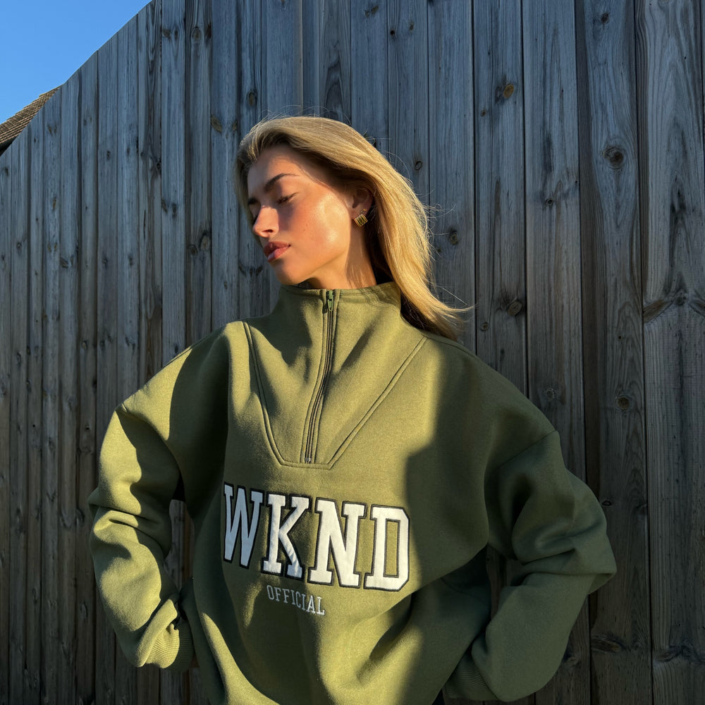 
                      
                        WKND HALF ZIP SWEAT
                      
                    